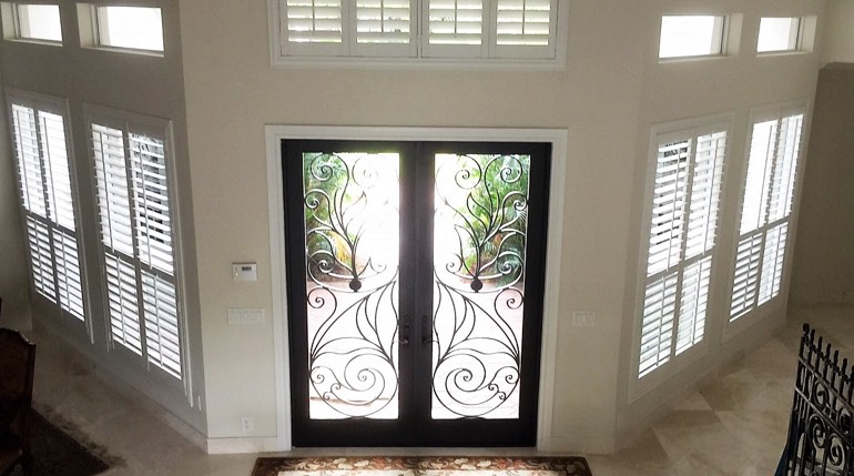 Boston foyer with glass doors and indoor shutters